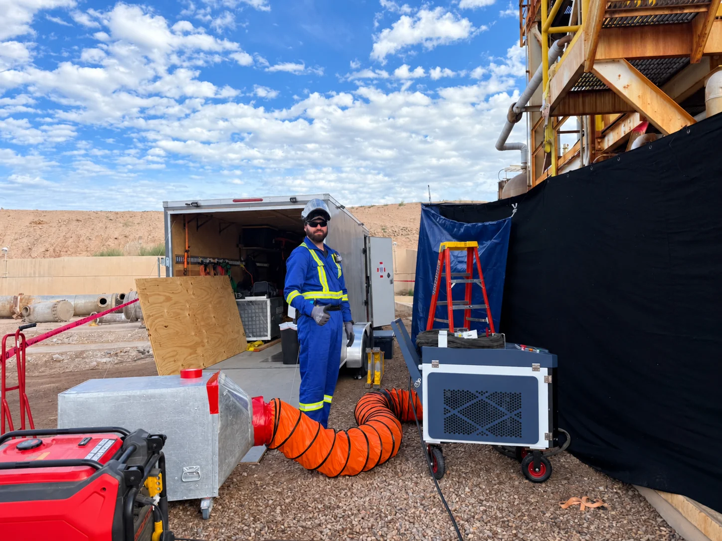 Michael Martin on-site with mobile laser cleaning and HEPA containment equipment